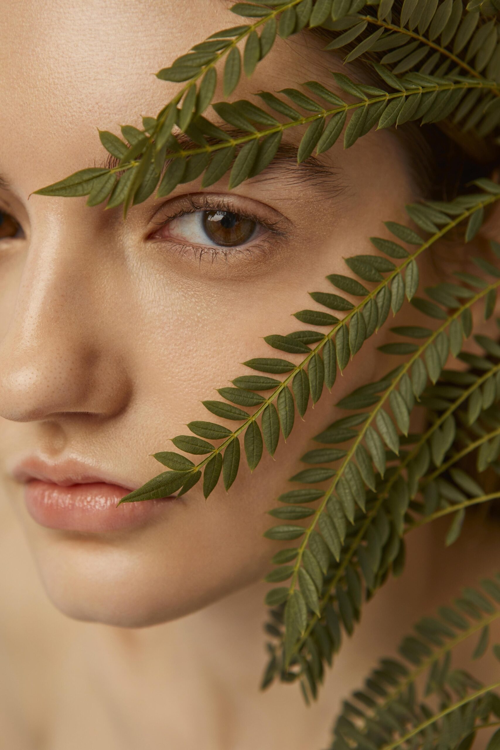 close-up-woman-posing-with-plant