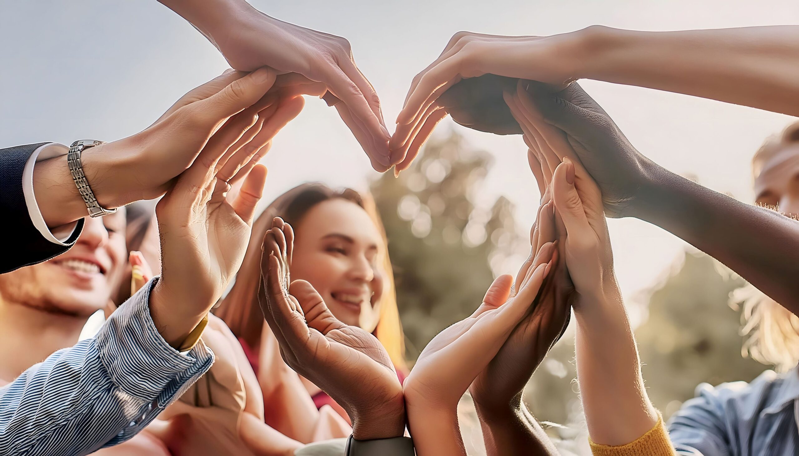 group-people-making-heart-with-their-hands